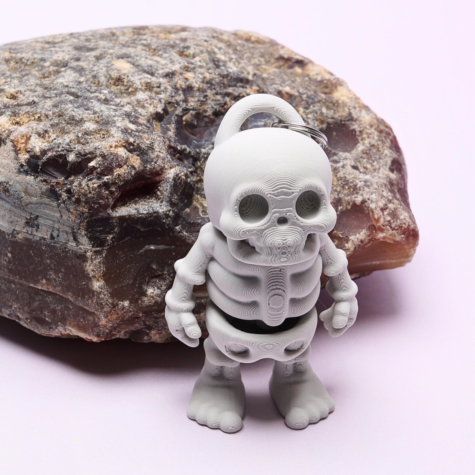 Flexi Fidget Skeleton Fun Stress Free Gift for Kids Play Clip On Backpack for School and Camp Pal away from Home Pocket Friend Skeleton Toy