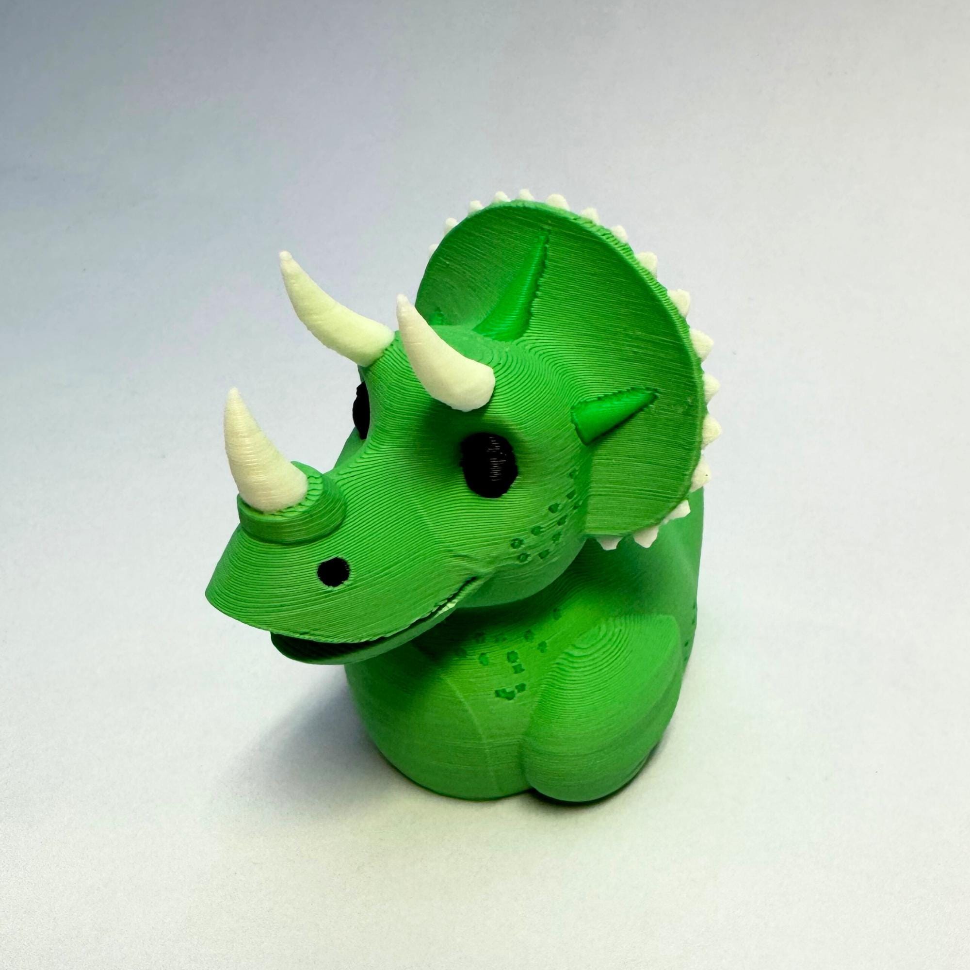 Triceratops Cruise Duck Gift Dinosaur Hide and Seek Duck with Sensory Horns Green Dino Ship Duck Collectible Stress Relief Cruise Keepsake